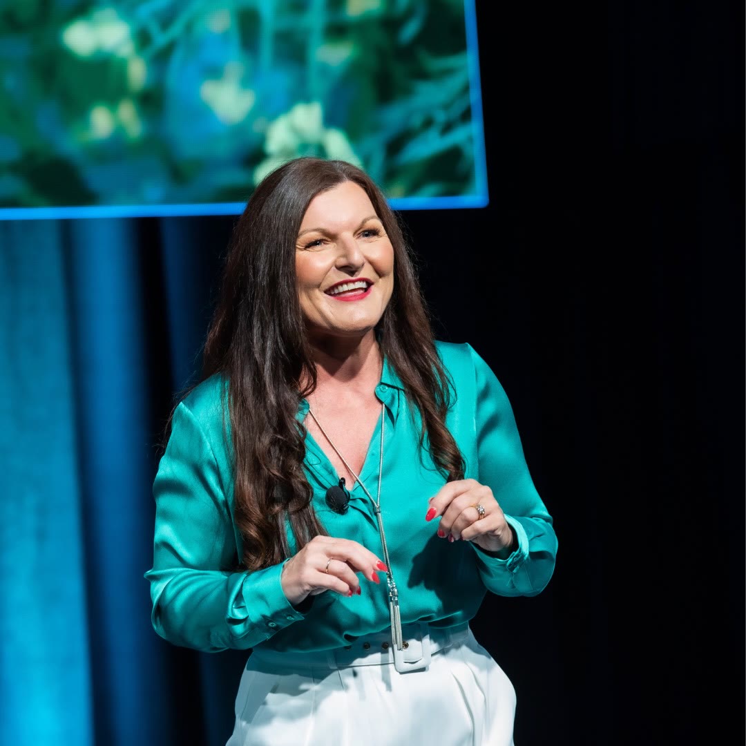 Annie Gibbins on stage, keynote speaker and 5× CEO