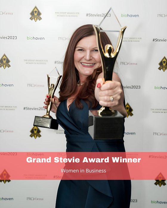 Annie Gibbins with Grand Stevie Award